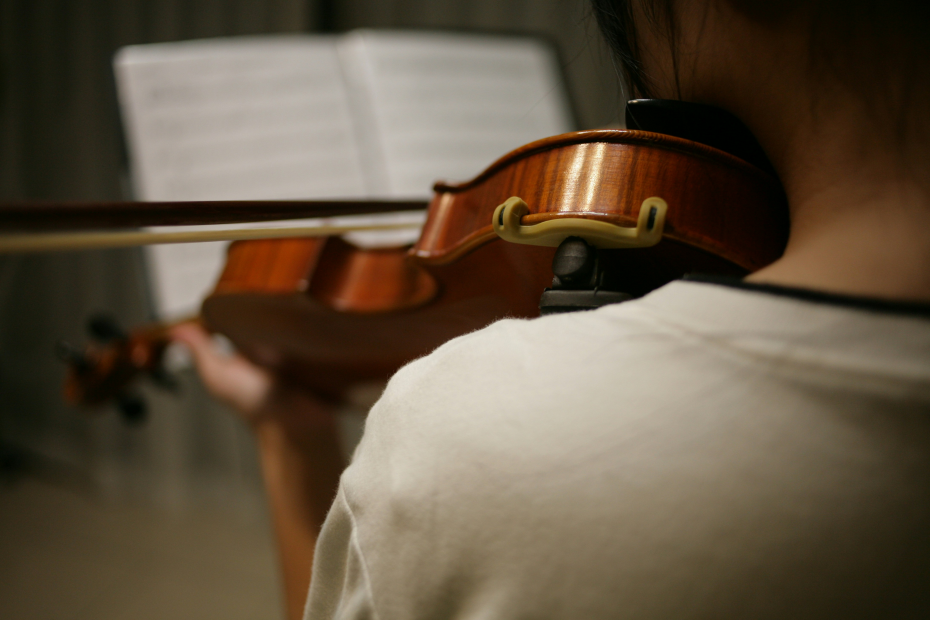 violin student practicing